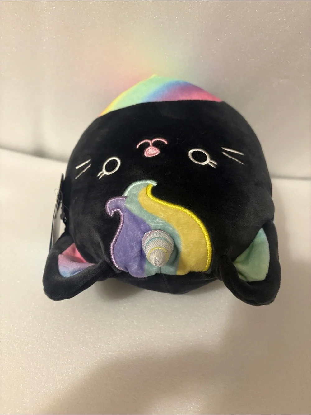 Squishmallows Black Unicorn Cat Plush with Rainbow Accents
